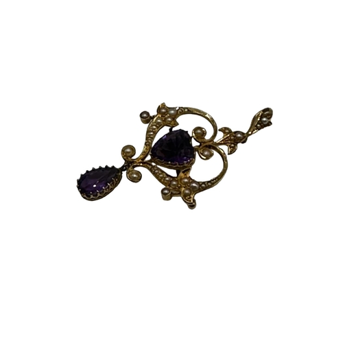 90 - A 15ct gold amethyst and split pearl art nouveau style pendant. 2.01g. In original box without chain... 