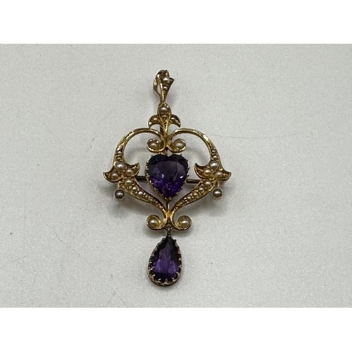 90 - A 15ct gold amethyst and split pearl art nouveau style pendant. 2.01g. In original box without chain... 