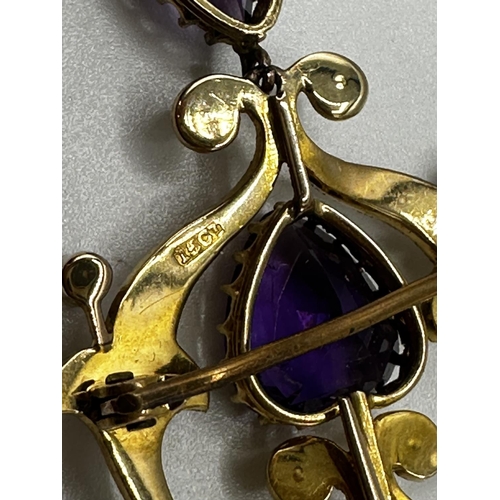 90 - A 15ct gold amethyst and split pearl art nouveau style pendant. 2.01g. In original box without chain... 