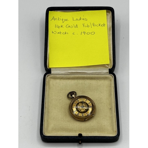 91 - A 14ct gold ladies pocket watch, gold face with Roman numeral markers. 8.7g.,