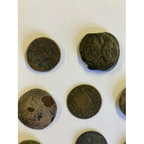 98 - A collection of coins of Antiquity. Roman possibly Greek examples in bronze. Most heavily worn.  Ple... 