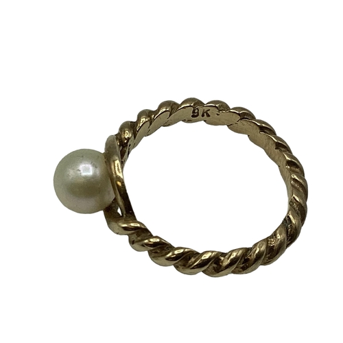 18 - Three pearl set gold rings. Two 9ct examples and a 14ct all set with single cultured pearl. 8.3 g.