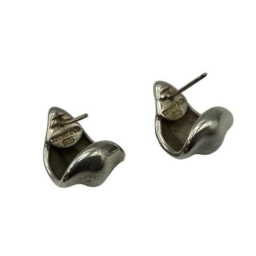 21 - A collection of sterling silver, white  metal and 9ct earrings to include Georg Jensen, Tiffany