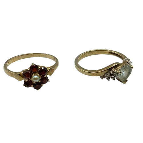 43 - Two 9ct gold gem set rings. Size M/O. 3.4g