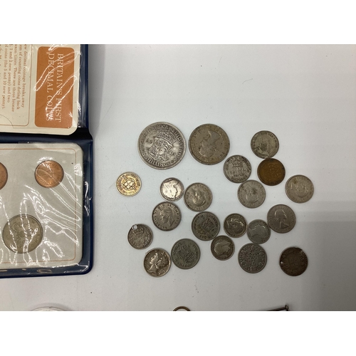 52 - A collection of coins, sixpences etc together with two WWI medals to PTE AG Jones ASG.