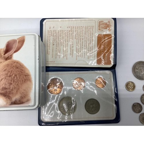 52 - A collection of coins, sixpences etc together with two WWI medals to PTE AG Jones ASG.