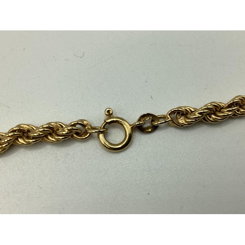 58 - A 9ct gold rope twist necklace. 82cm, 20.53g. Together with a 9ct gold mounted citrine swivel watch ... 