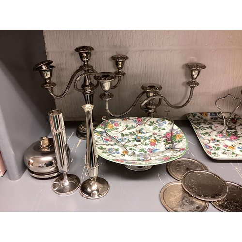 10 - A collection of silver plated wares to include candelabra, Taza, model horses etc