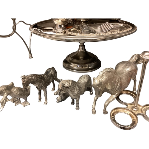 10 - A collection of silver plated wares to include candelabra, Taza, model horses etc