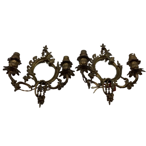 251 - A pair of early C20th wall sconces with oval mirrors and foliate decoration, approx 31cm High overal... 