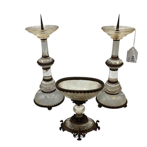 259 - A pair of quartz glass candle sticks, 23cm H overall, and a fluted raised bowl, some general wear, s... 