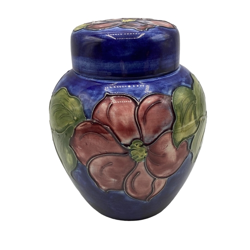 260 - A Moorcroft ginger jar and cover, label to base, 15cm High