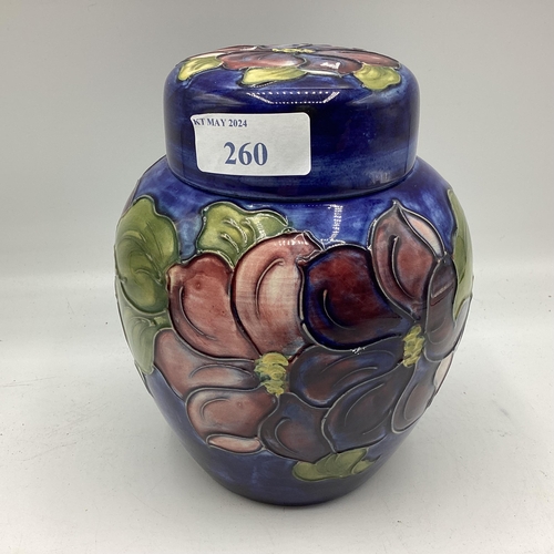 260 - A Moorcroft ginger jar and cover, label to base, 15cm High