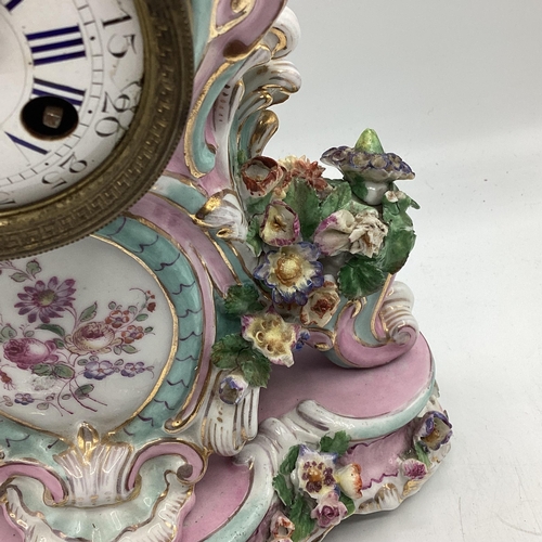 261 - A Meissen clock on stand, and a two branch candleholder, 22cmH,