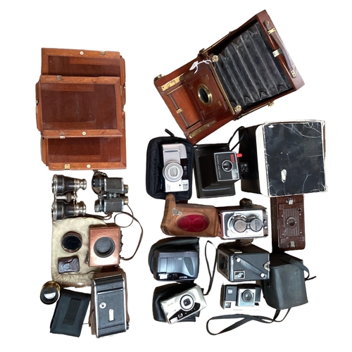 262 - A quantity of vintage cameras including a Marion & Co, 22 & 23 Soho Square, London W, see images