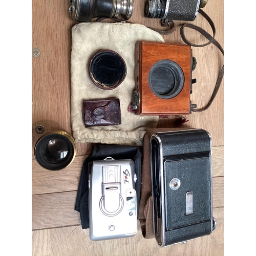 262 - A quantity of vintage cameras including a Marion & Co, 22 & 23 Soho Square, London W, see images