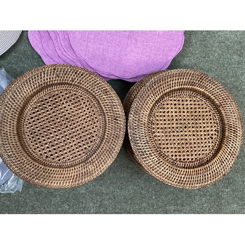 263 - A large quantity of table mats, including 12 OKA rattan under plates