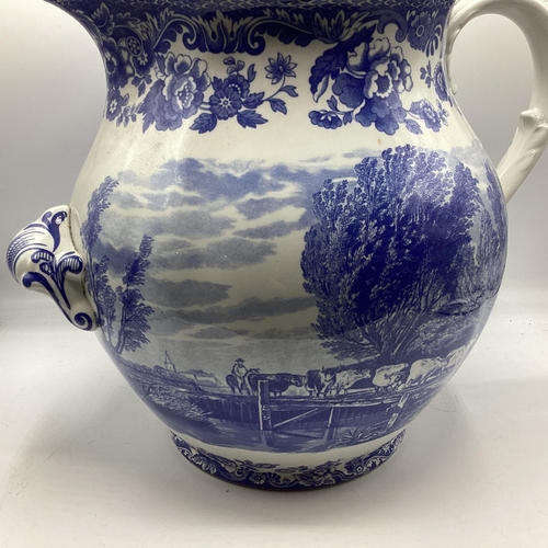 265 - An oversized blue and white Spode jug, marked to base, 