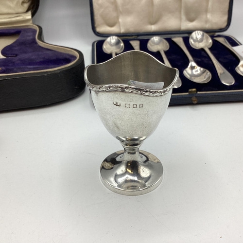 61 - Collection of sterling silver items, teaspoons, egg cups etc, Various dates and makers.