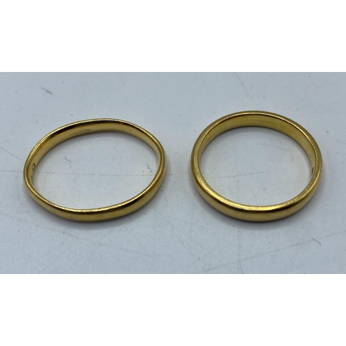 140 - Two 22ct gold wedding bands, 5.6g, size L and size K.