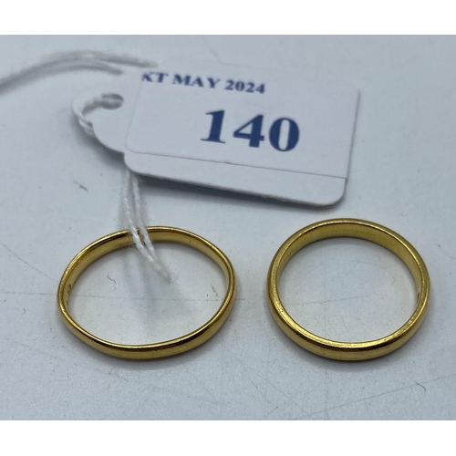 140 - Two 22ct gold wedding bands, 5.6g, size L and size K.