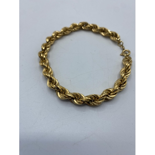 141 - An 18ct gold rope twist bracelet , 21cm, 12.7g