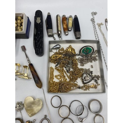 38 - A collection of silver, unmarked white metal and costume jewellery.