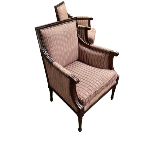 543 - A pair of large square mahogany framed armchairs with brown striped upholstery