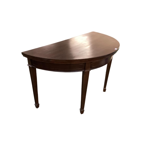 545 - An Edwardian dark mahogany D-end/demi-lune side table in the Sheraton style