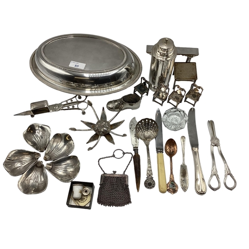 63 - A collection of unmarked white metal items to include wick scissors, dolls house furniture and other... 