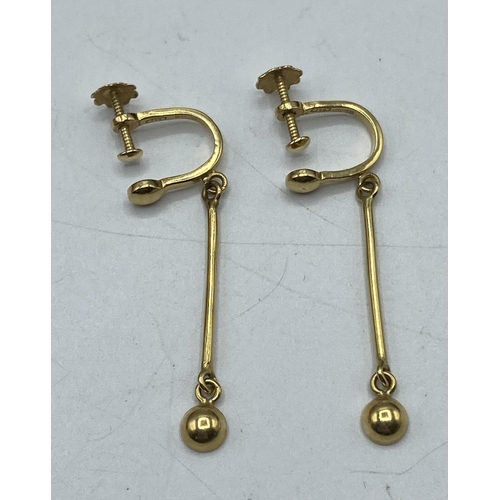 77 - A pair of 18ct gold chandelier earrings together with an 18ct gold pendant. 7.5g.