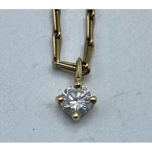 87 - A single stone diamond set pendant on a 9ct gold fancy link necklace. 3.06g.