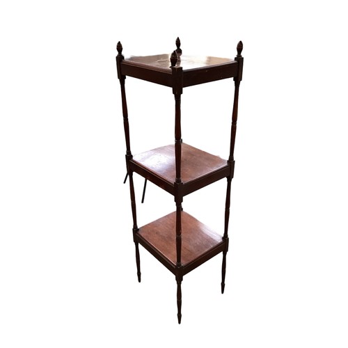 574 - A Victorian mahogany tall three tier whatnot, 140cm H (one finial glued)