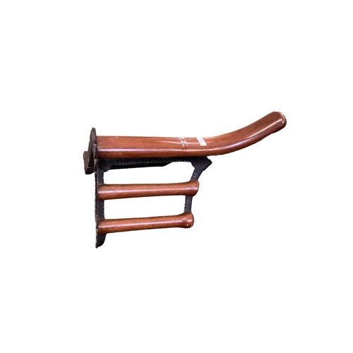 229 - A vintage style wooden and metal wall mounting saddle horse, 50cm L