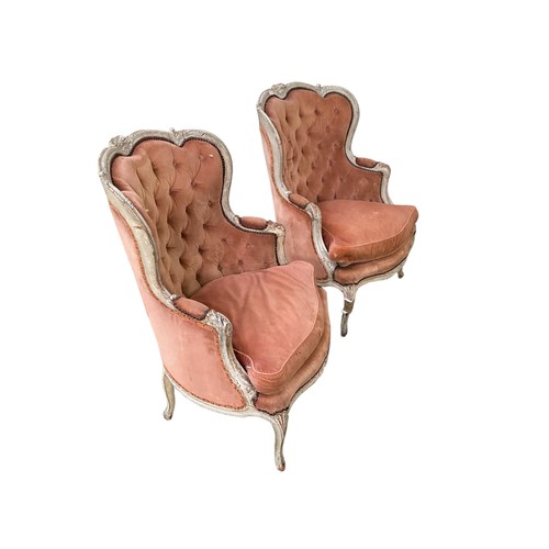 607 - Pair of button backed upholstered French style painted arm chairs, wear to upholstery and other wear... 