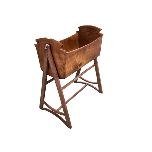 605 - A modern mahogany cradle on stand. Bespoke piece commissioned by vendor in 1987, from Quantocks in S... 