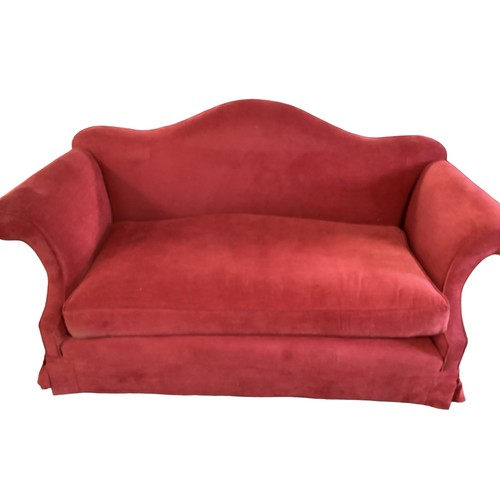 616 - Pair of red upholstered Camel back sofas, old frames. Now in need of re-upholstery