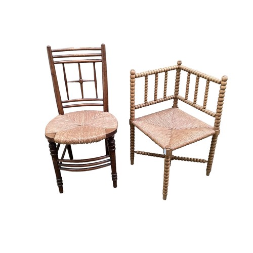 561 - A Victorian bobbin turned corner chair, and a William Morris style rush seat chair