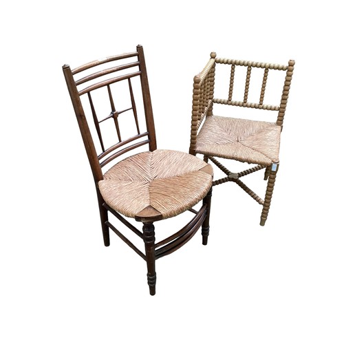 561 - A Victorian bobbin turned corner chair, and a William Morris style rush seat chair