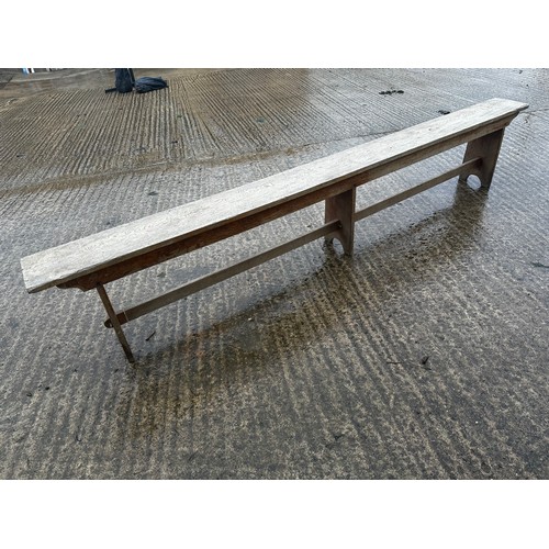 590 - A pair of long oak benches. 274 cm L with  black cushions and a pine bench 274 cm L