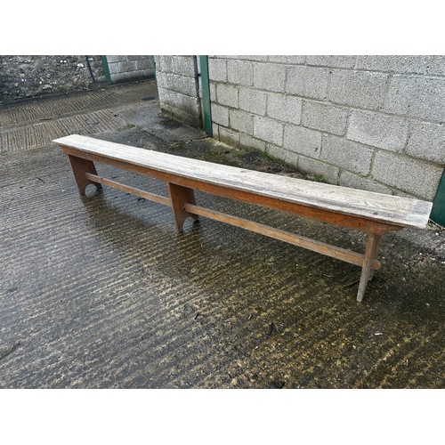 590 - A pair of long oak benches. 274 cm L with  black cushions and a pine bench 274 cm L