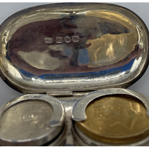 16 - A George V Gold sovereign dated 1912 in a sterling silver double sovereign case with engraved top '2... 