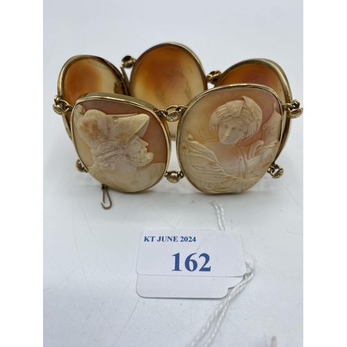 162 - A 19th century cameo bracelet. Five oval cameos of classical busts in an unmarked yellow metal mount... 