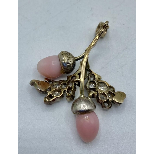 2 - A Conch pearl and  diamond oak leaf design pendant in an unmarked yellow and white metal mount. Each... 