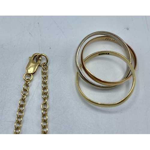 166 - An 18ct tricoloured gold Three band Russian ring on an 18ct gold chain link necklace. Ring Size L. L... 