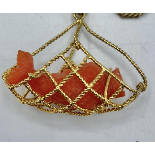 171 - An 18ct gold and pink coral pendant on a 9ct gold chain link necklace. Gross 11g.