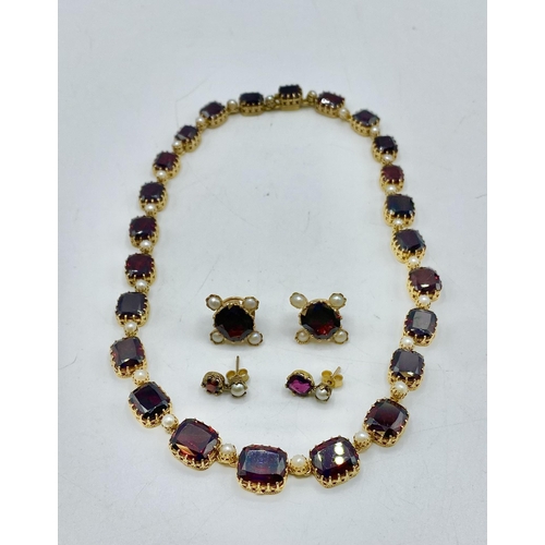 4 - A late 19th century unmarked yellow metal garnet and pearl collar necklace together with two pairs o... 
