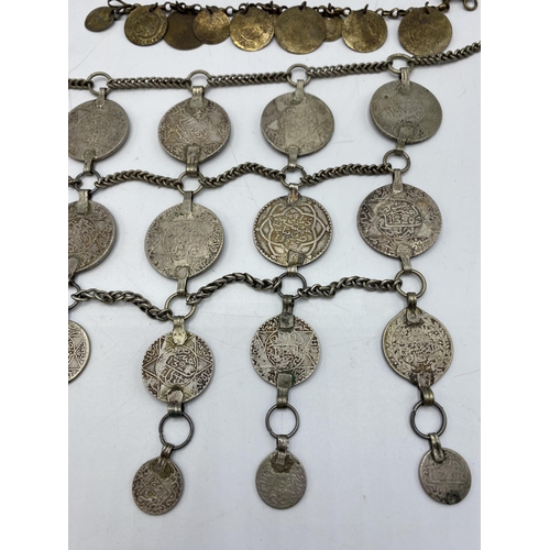 180 - A Moroccan Berber coin set necklace together with other coin set white metal items.