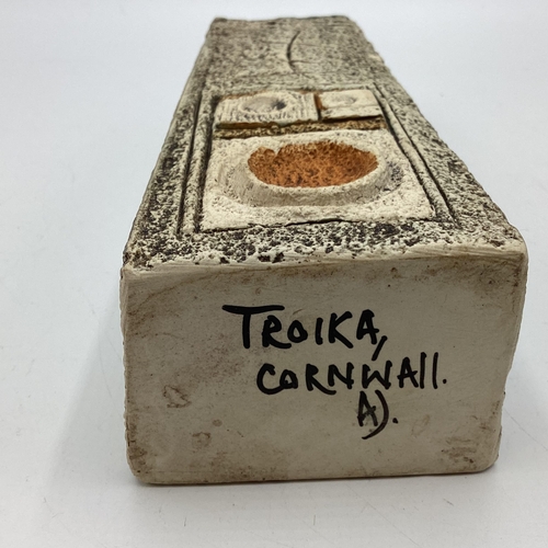 211 - A Troika Coffin vase. Signed to base Troika Cornwall AJ, Anne Jones 1976-1977. 18cm (h)