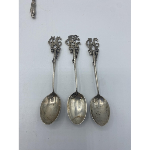 29 - A collection of sterling silver flatware and an unmarked white metal toddy ladle. 357g.
